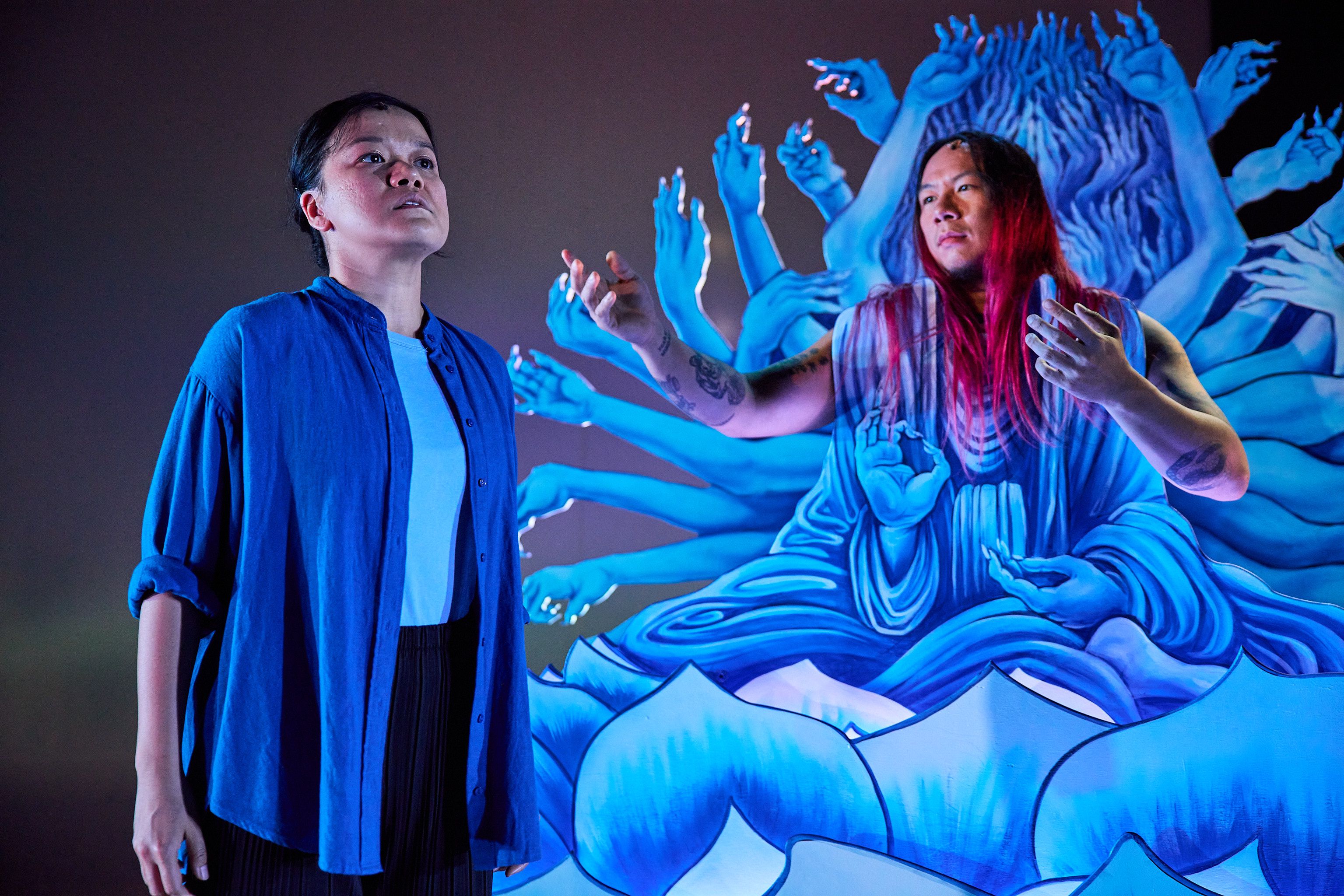 Joe Paradise Lui is seen as a godly figure and Merlynn Tong looks longingly into the distance