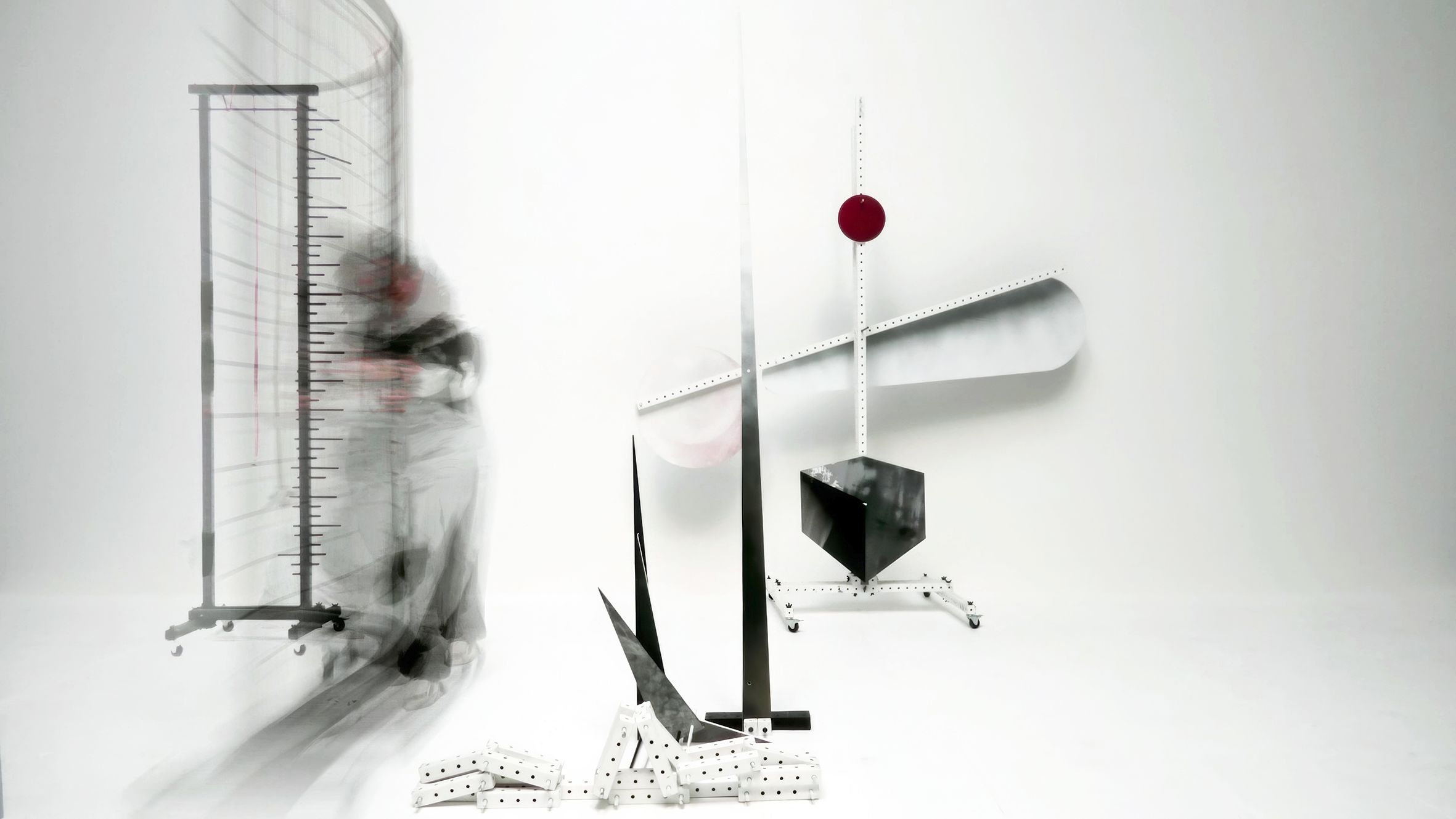 Abstract art in motion with a blurred figure and geometric shapes.