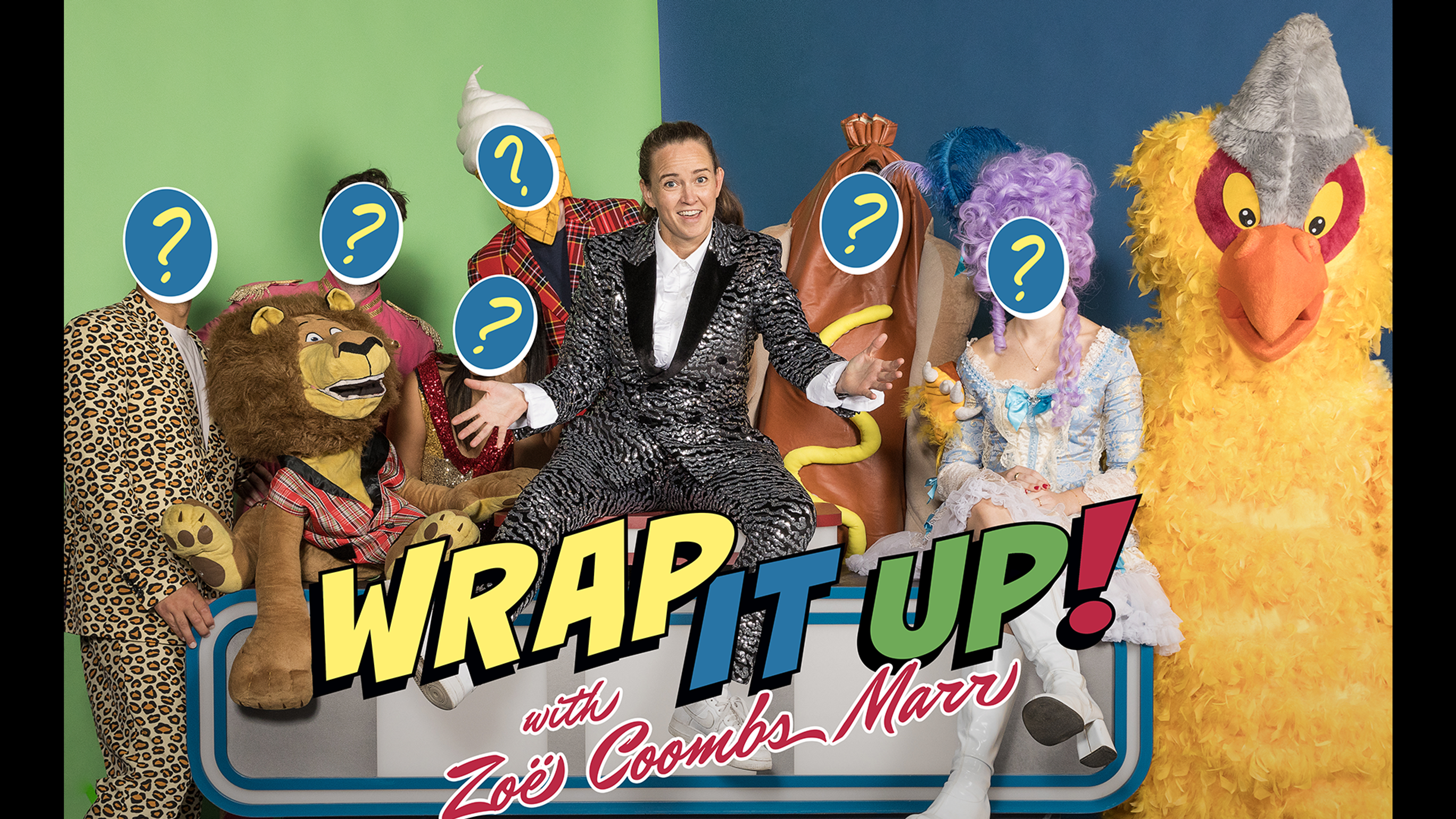 oë Coombs Marr dressed as a variety show host, surrounded by costumed characters with question marks superimposed on their faces. Titles read “Wrap it up! With Zoë Coombs Marr”