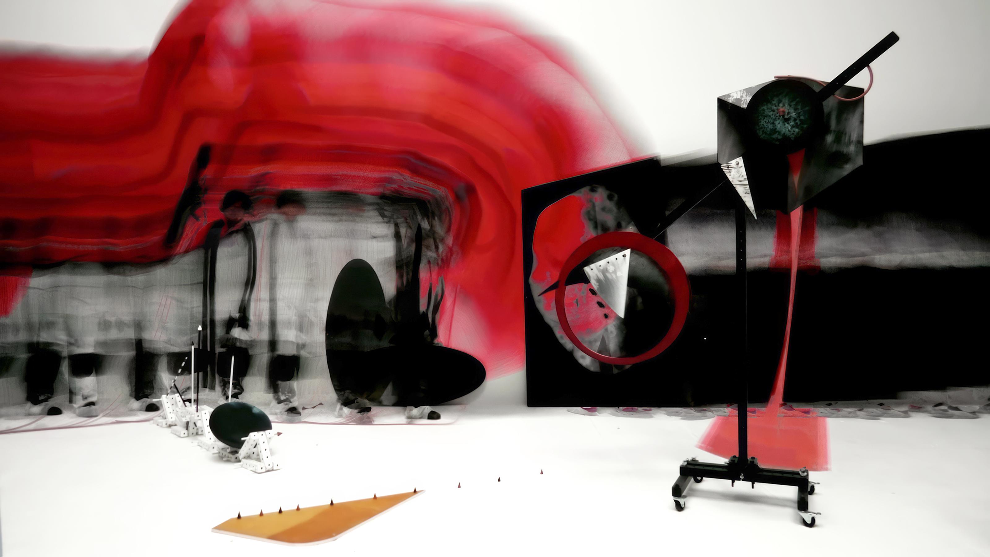 A moving structure smears red across the back wall and other objects within its path.