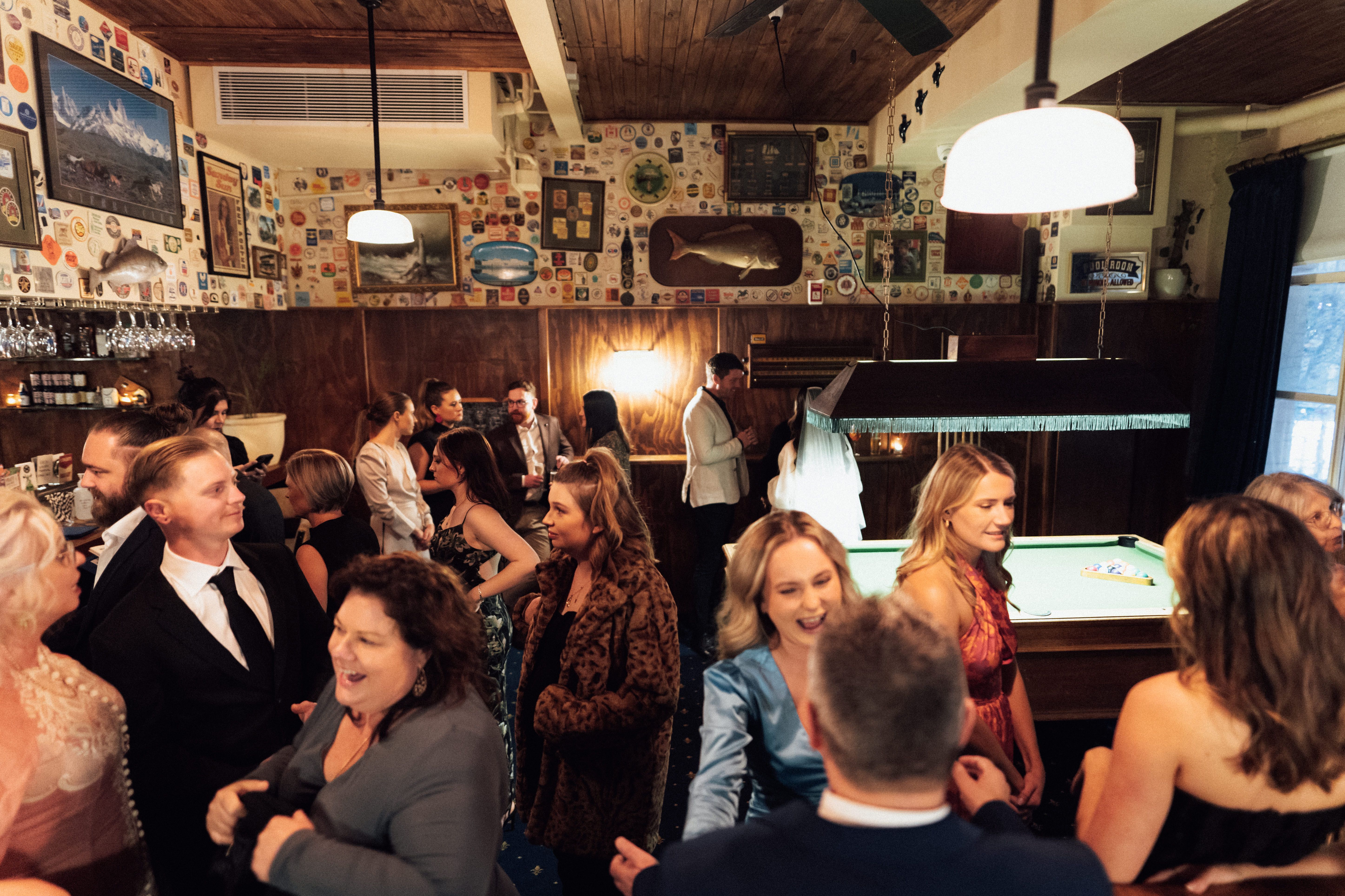 A group of people gathering at Dom's Social Club